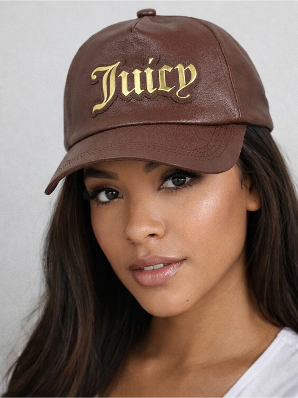 JuicyCouture brown faux leather baseball cap with iconic gold “Juicy” logo Y2K